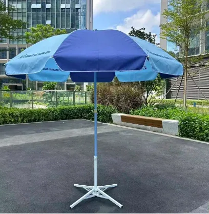 Two-tone blue advertising parasol with printed text on the canopy, on a white metal cross stand