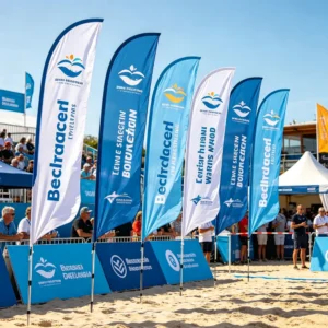 Row of blue custom feather flags at a beach sports event