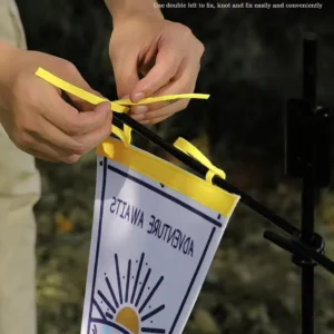Tying a custom pennant flag with ribbon straps
