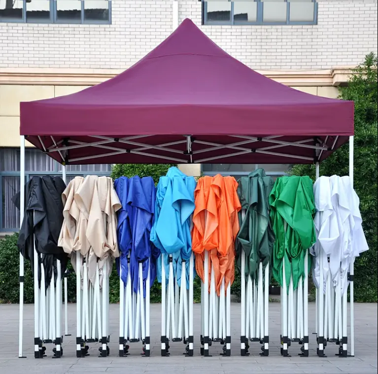 Pop-up tents shown in multiple canopy colors
