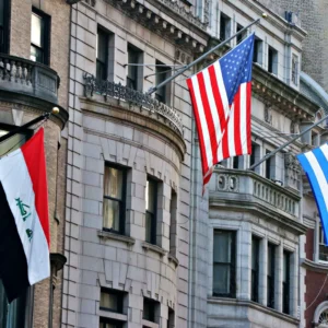 National flags mounted on a building facade